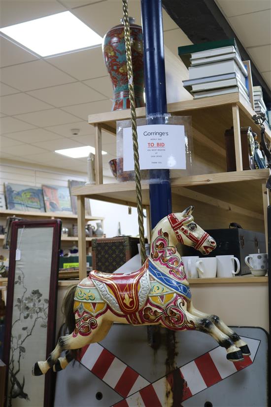 An Edwardian polychrome painted carved wood carousel horse